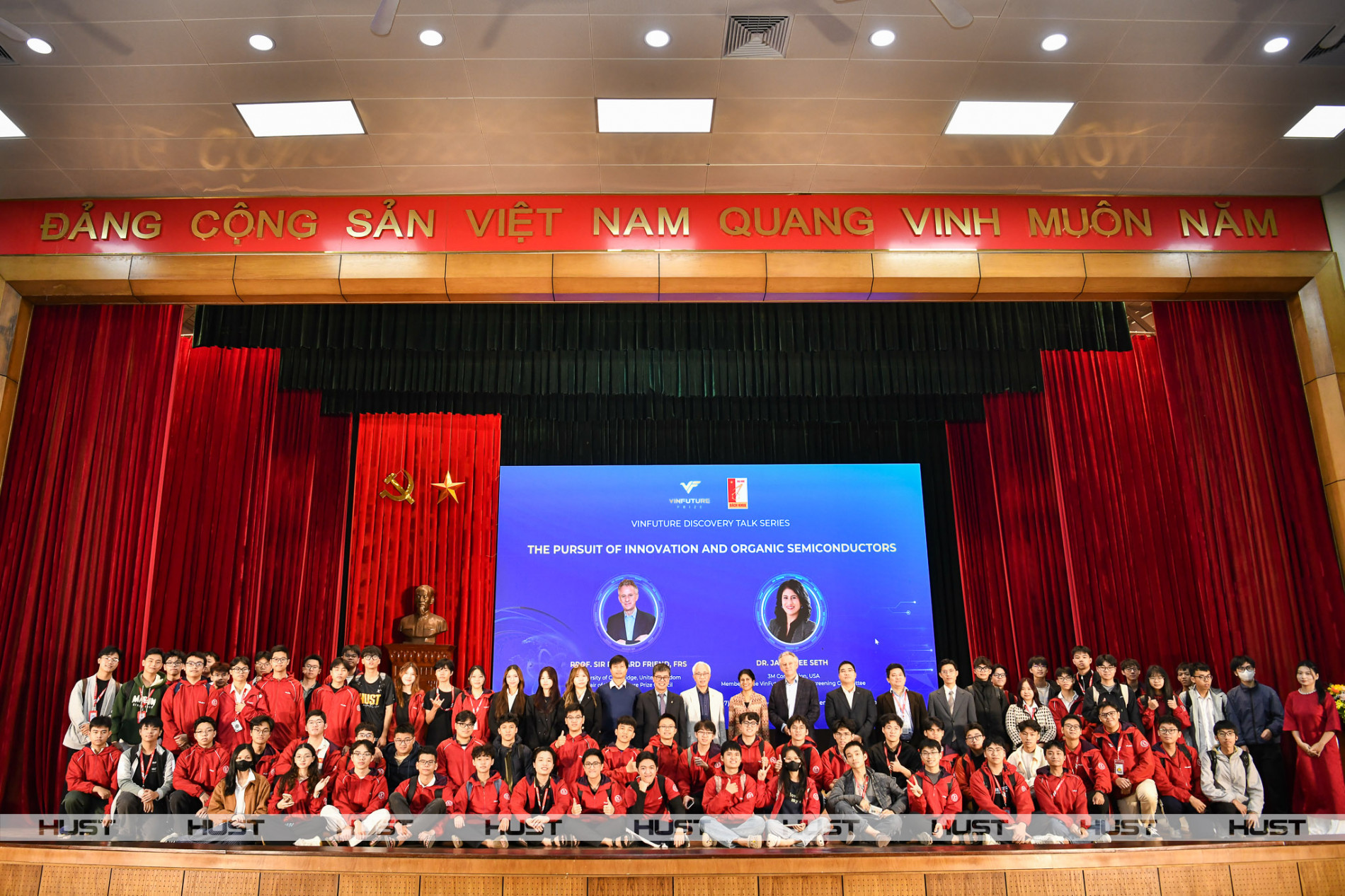 Delegates and students take a commemorative photo at the event.