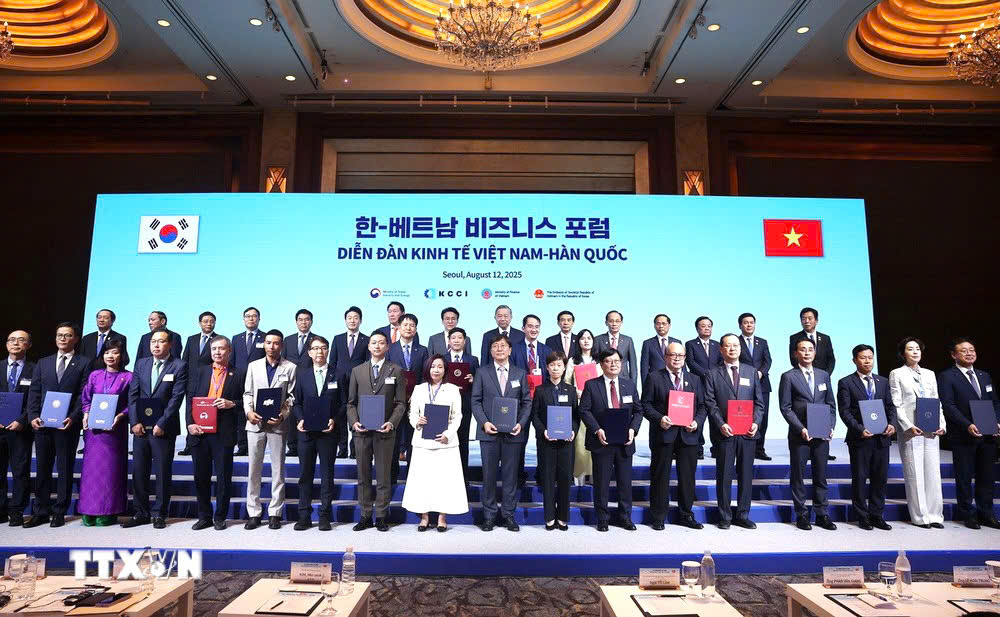 tbt to lam va quan chuc vn hq chung kien le trao cac thoa thuan hop tac